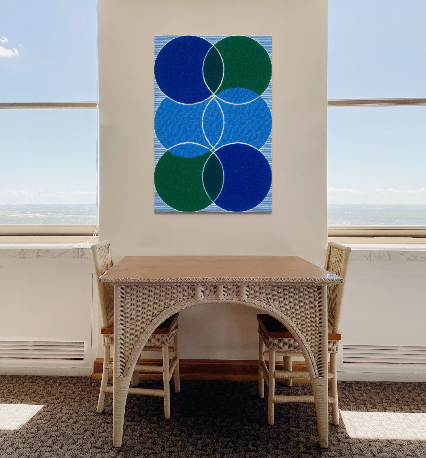 Peinture Minimaliste aux Cercles Entrelacés en Bleu et Vert