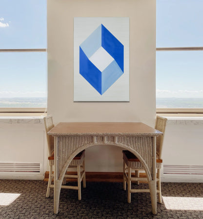 Tableau Minimaliste au Cube Géométrique en Bleu et Blanc