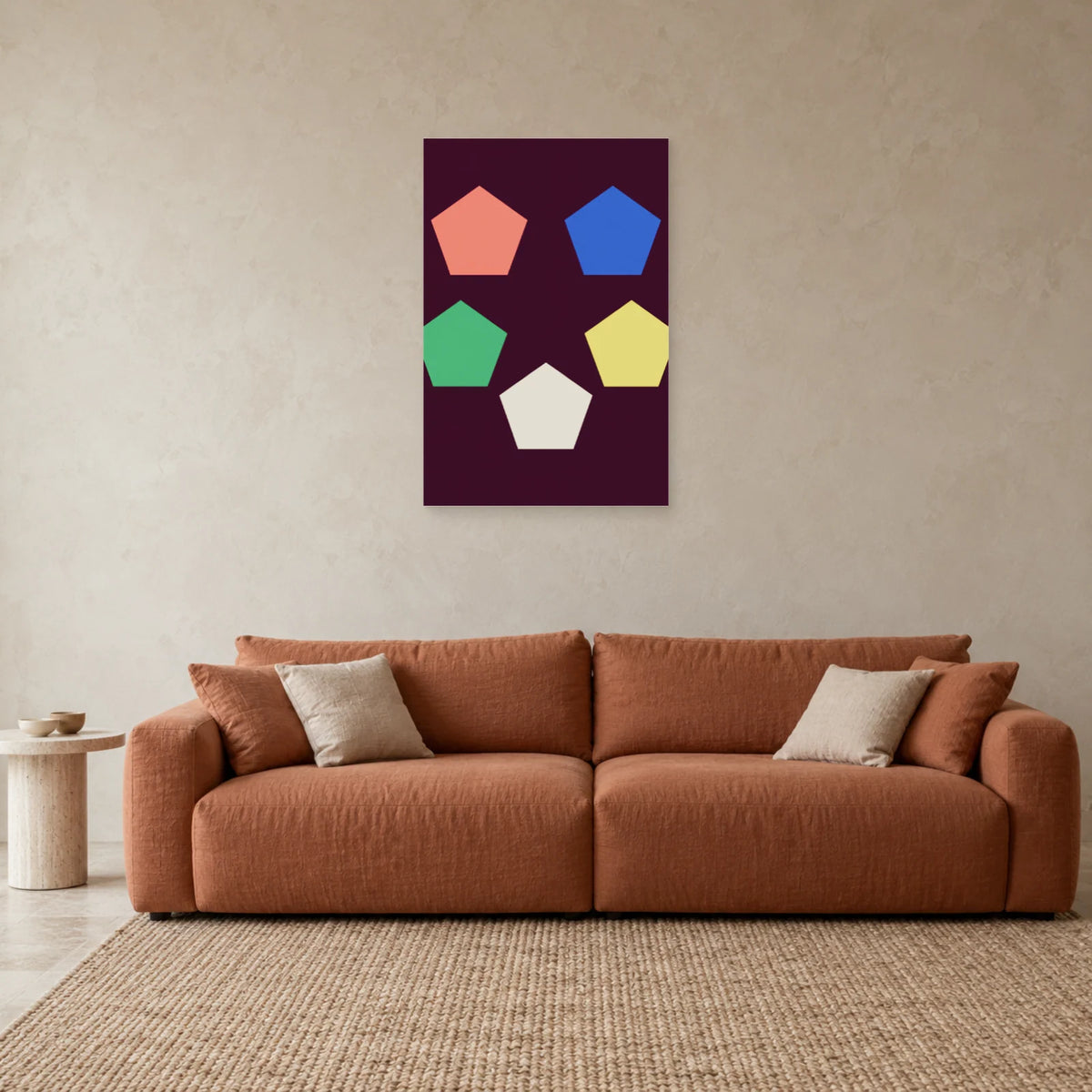 Pentagon poster above a rust sofa with cream cushions