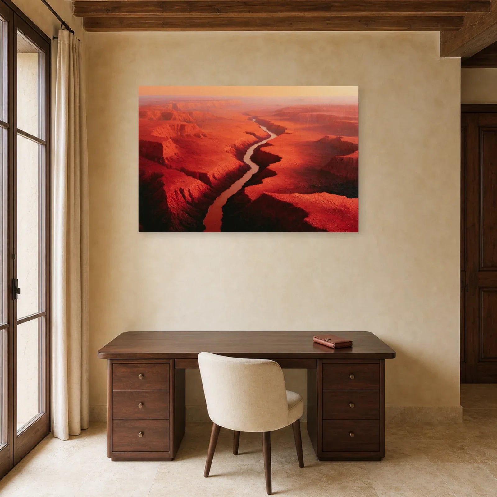 Tableau paysage minéral rouge présenté dans un bureau