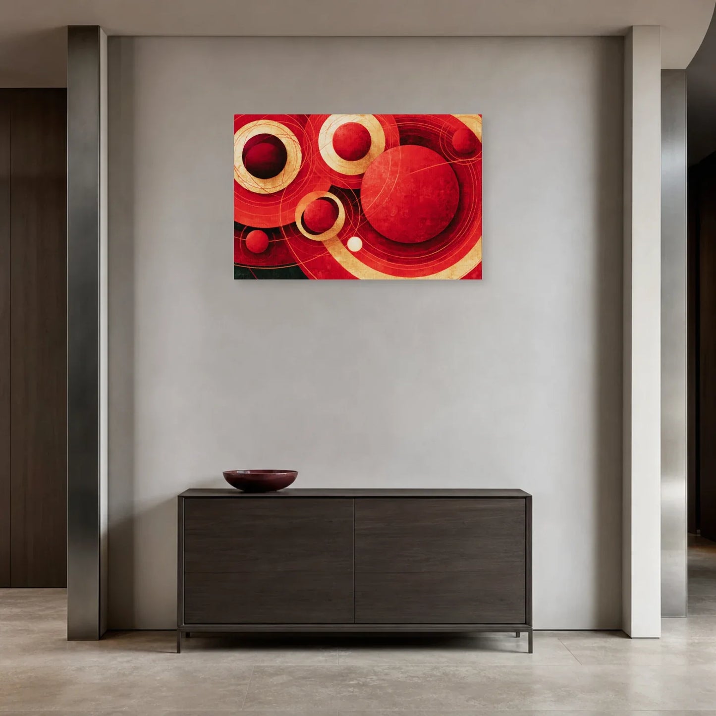 Tableau cercles rouges abstrait présenté dans une entrée