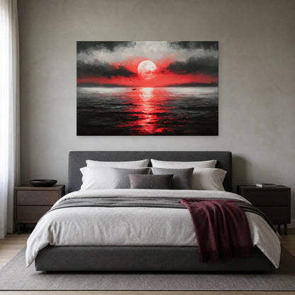 Tableau lune rouge sur la mer présenté dans une chambre