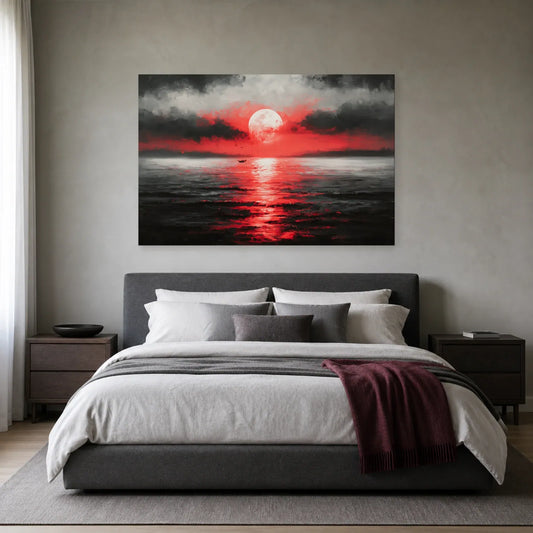 Tableau lune rouge sur la mer présenté dans une chambre